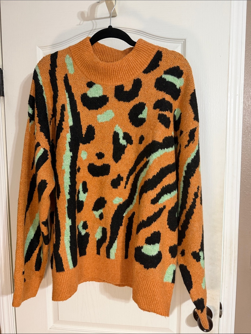 Orange Animal-Print Crewneck Sweater with Mint and Black Accents